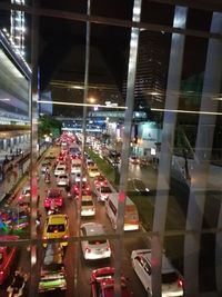 Traffic on road in city at night