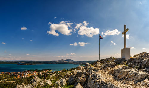 Scenic view of sea and buildings against sky