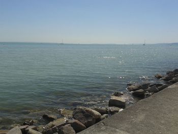 Scenic view of sea against clear sky