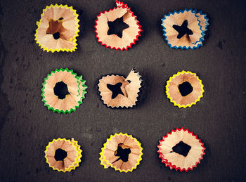 High angle view of multi colored candies on table