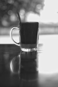 Close-up of coffee cup on table