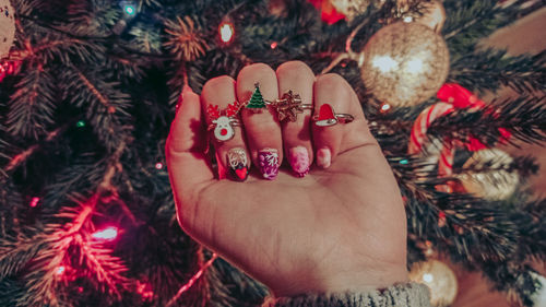 Midsection of woman with christmas decorations