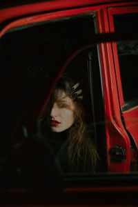 Portrait of woman in car