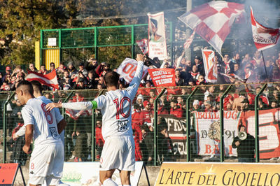 Group of people against the wall