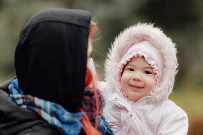 Portrait of cute girl in snow