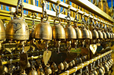 Gold bells hanging at wat phra that hariphunchai is a buddhist temple in lamphun, thailand.