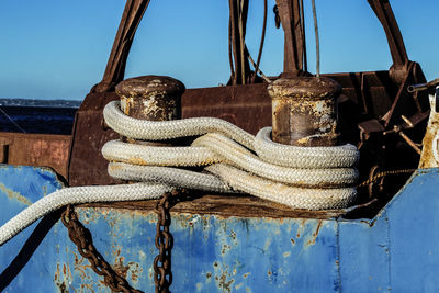 Rope on boat against sky