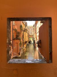 Canal amidst buildings in city