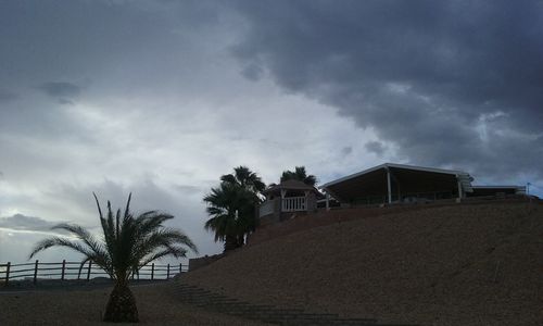 Built structure against cloudy sky