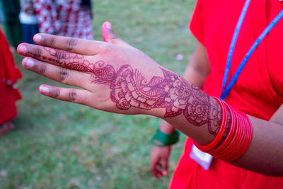 Close-up of woman hand with tattoo