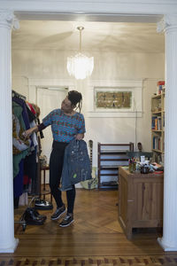 A young woman in a wardrobe