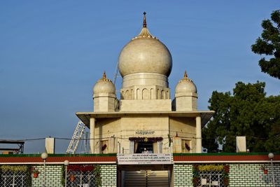 View of building against clear blue sky