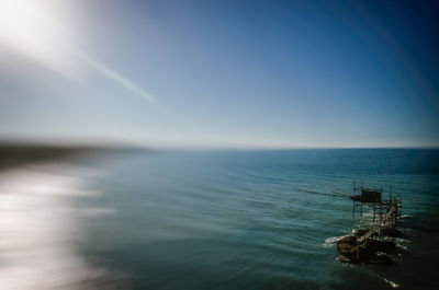 Scenic view of sea against blue sky