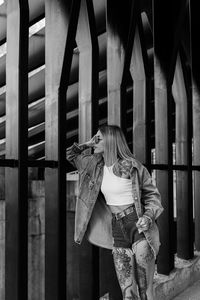 Portrait of a pretty tattooed girl in urban scene