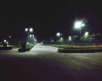 Illuminated street lights at night