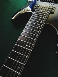 Close-up of playing guitar