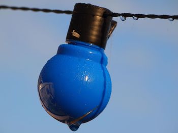 Low angle view of water against blue sky