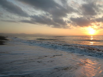 Scenic view of sea against sky during sunset