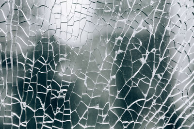 Full frame shot of broken glass window