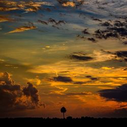 Scenic view of dramatic sky during sunset