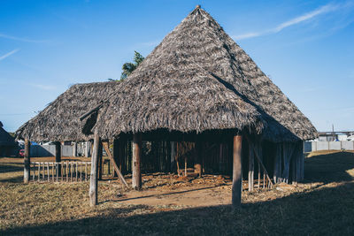 House on field against sky