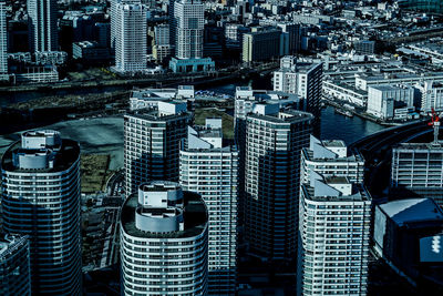 High angle view of modern buildings in city