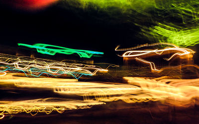 Close-up of illuminated light trails at night