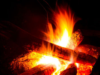 Close-up of bonfire against sky at night