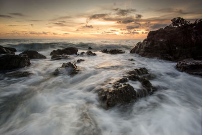 Scenic view of sea against sky during sunset