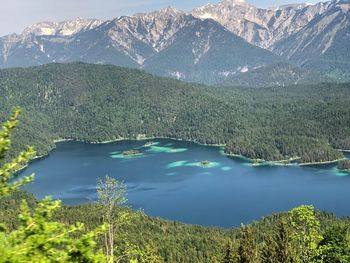 Scenic view of lake by mountains