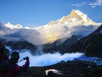 Scenic view of snow covered mountains