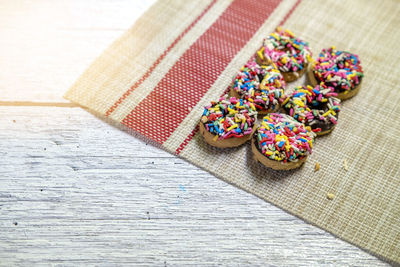 High angle view of multi colored candies on table