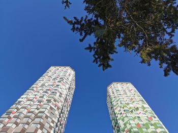 Low angle view of building against blue sky