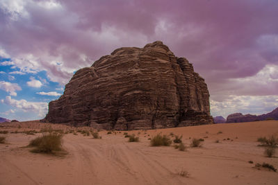 Rock formations in desert against sky