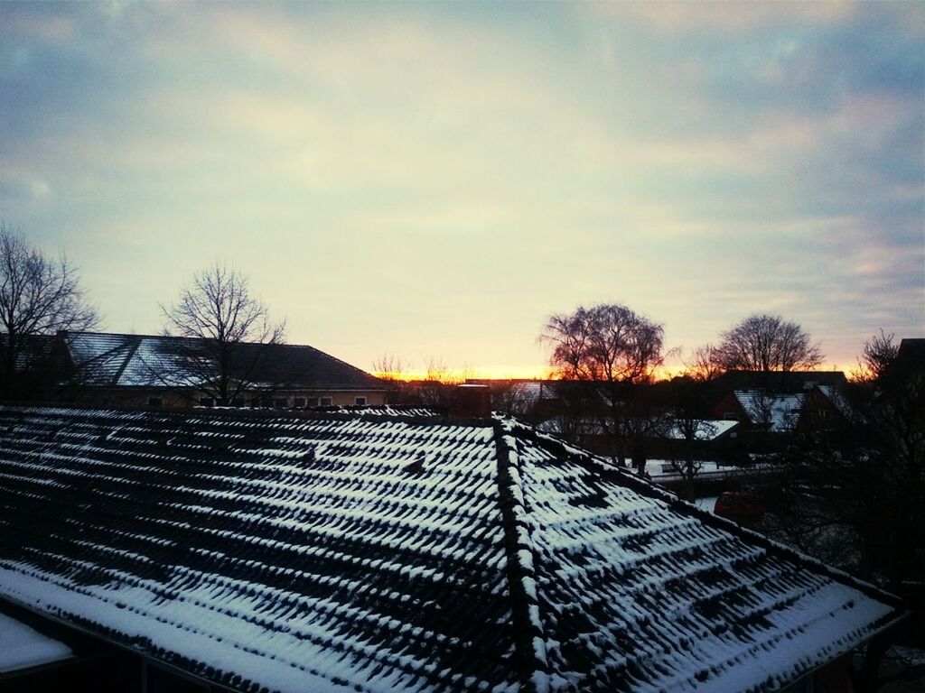 snow, winter, cold temperature, sky, building exterior, bare tree, tree, built structure, cloud - sky, architecture, sunset, weather, house, season, roof, covering, landscape, nature, cloudy, field