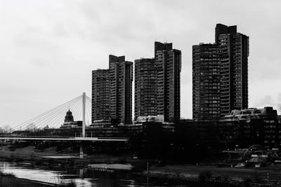 Buildings in city against sky