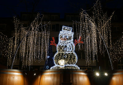 Illuminated christmas tree at night