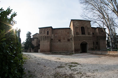 Low angle view of old building against sky