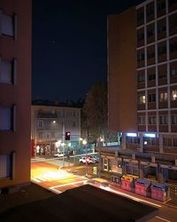 Buildings in city at night
