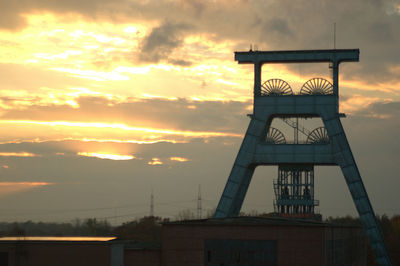 Tower against sky during sunset