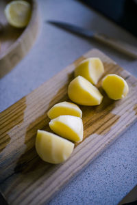 High angle view of oranges on cutting board