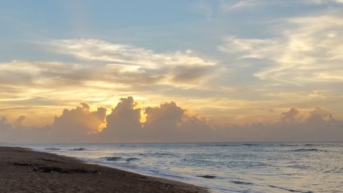 Scenic view of sea at sunset