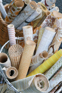 High angle view of various papers displayed for sale