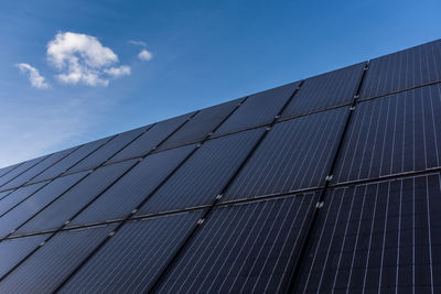 Solar panels on roof and blue sky