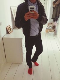 Full length of woman standing in park