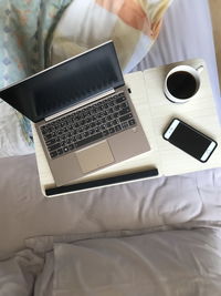 High angle view of coffee cup on table