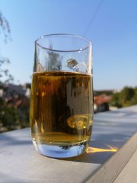 Close-up of beer glass on table