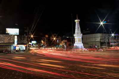 Light trails on city street at night