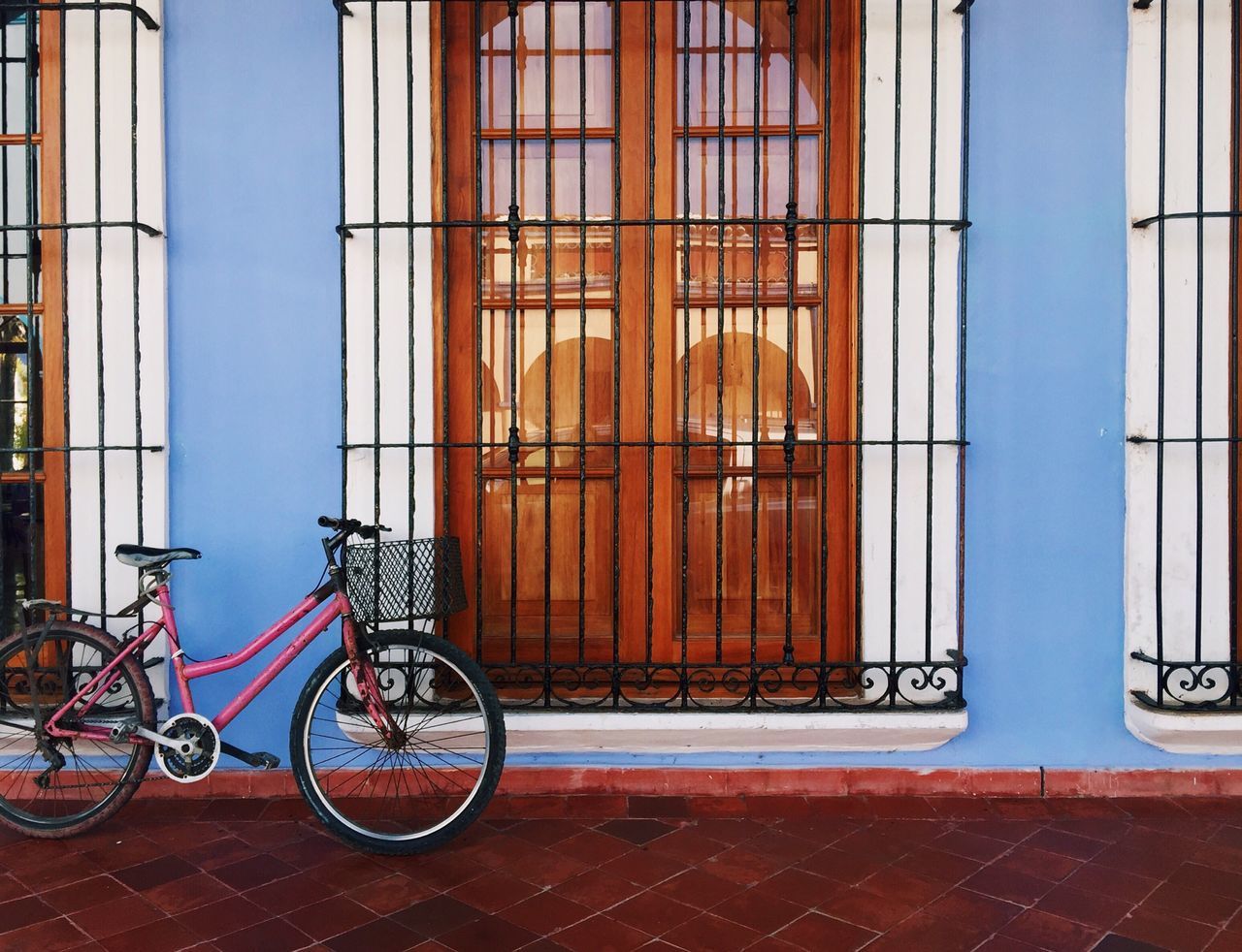 architecture, built structure, mode of transport, city, stationary, parking, parked, building, day, outdoors, no people, modern, blue, city life