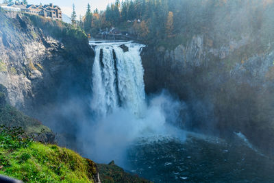 A blanked of mist obscures snoqualmie falls in washington state.